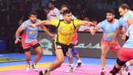 Siddharth (L) watches as Rahul Chaudhari raids